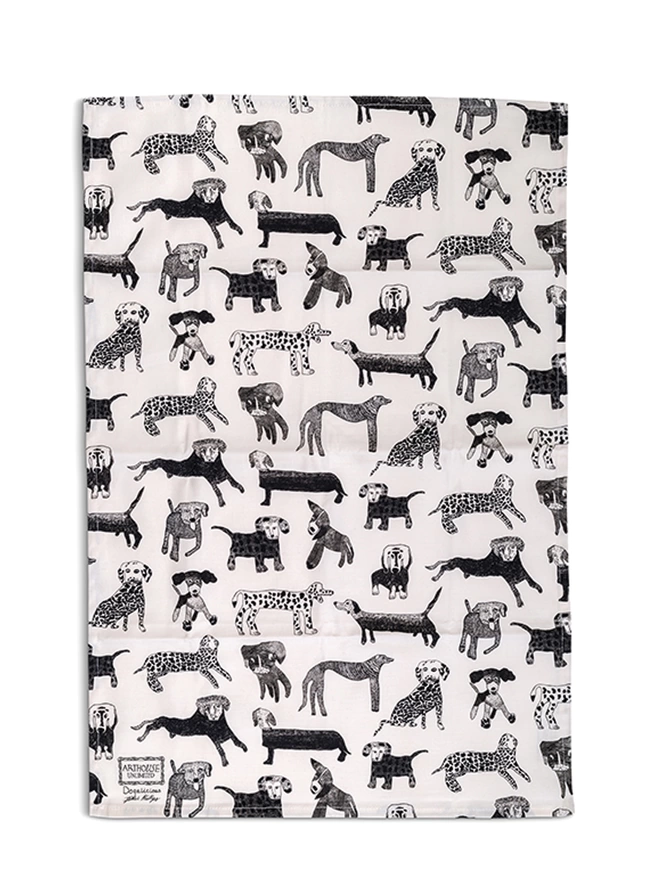 Close up of dogalicious 100% organic cotton charity tea towel with black dog illustrations