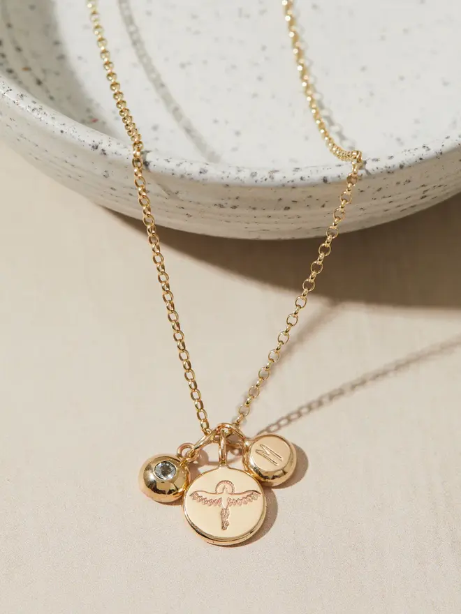 9ct Gold Phoenix Pebble Necklace with a letter charm and a birthstone charm