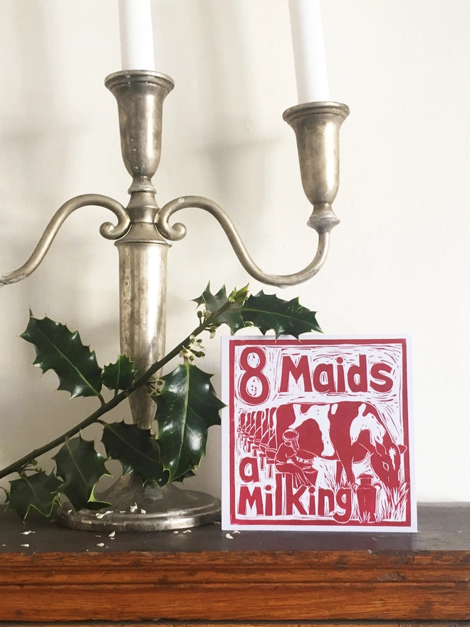Christmas card Eight Maids a Milking The Twelve Days of Christmas linocut design by Kate Guy
