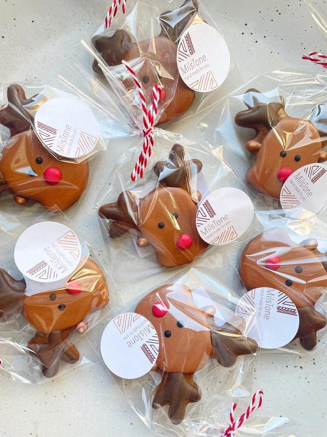 Hand-iced Christmas reindeer biscuit, individually wrapped in eco-friendly packaging, available in Vanilla or Gingerbread flavour
