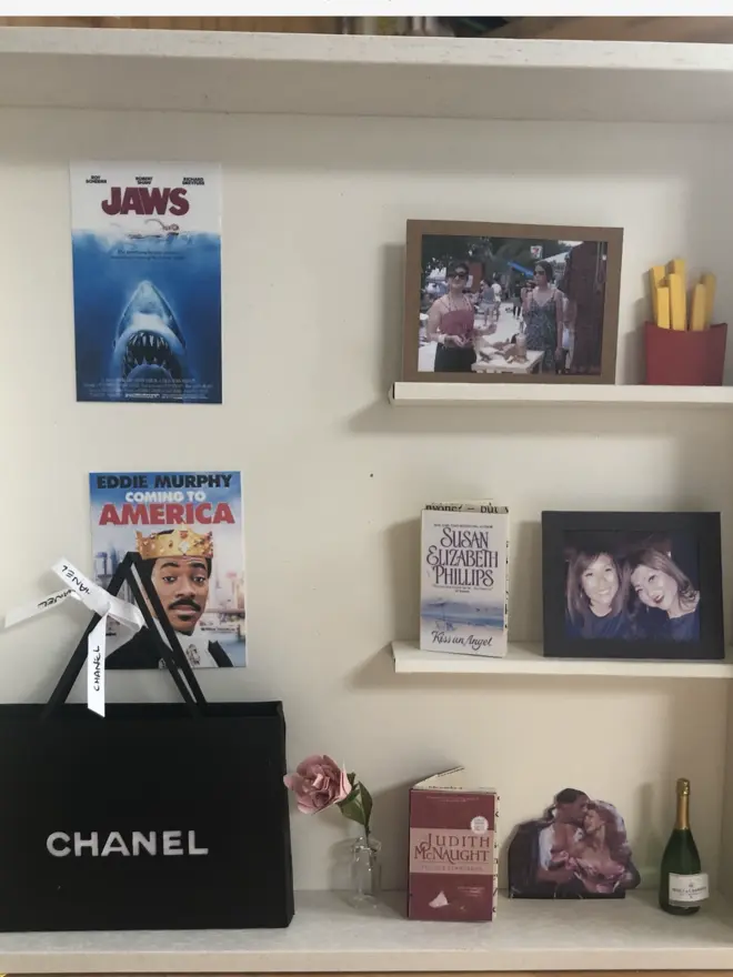 a wooden box with miniatures of the person favourite things inside. Each piece is handmade specially on request. bespoke art piece made by My Papercut Forest