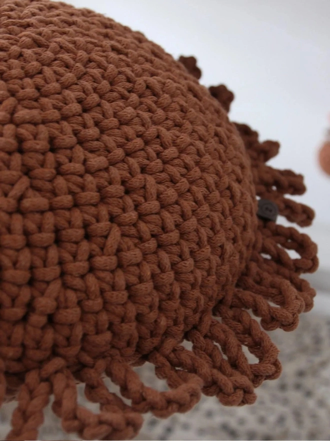 hand crocheted brown cushion