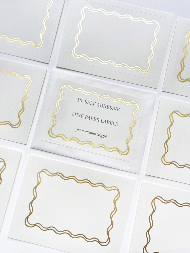 Pack of luxe white with gold scallop adhesive labels