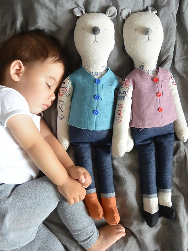 tattooed bear doll. two cream linen bear dolls with embroidered arm and neck tattoos and a blue or pink waistcoat.