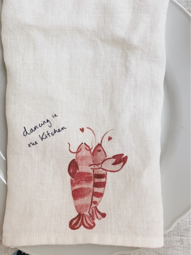 lobster couple dancing in the kitchen print linen napkin lifestyle shot