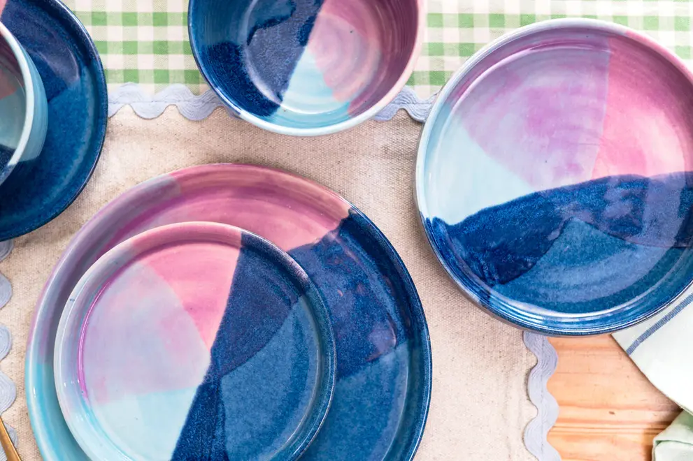 Landscape Dinner Plates (Set Of 4), a colourful table setting made by plate, napkins and other dining items. 