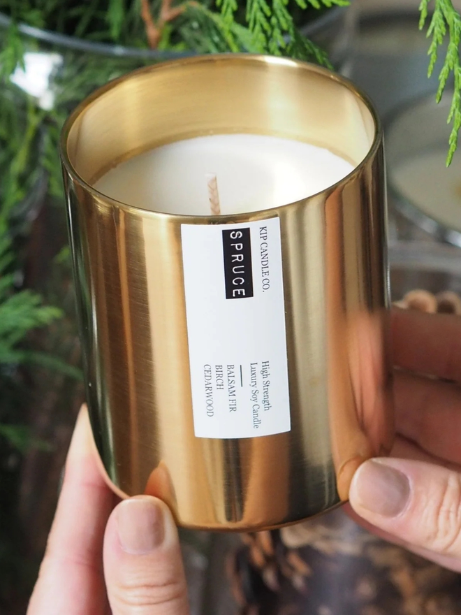 Spruce gold tin Christmas scented candle