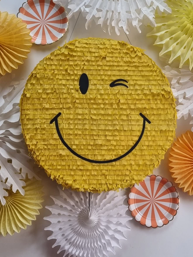 winking face pinata made to order by pinyatay