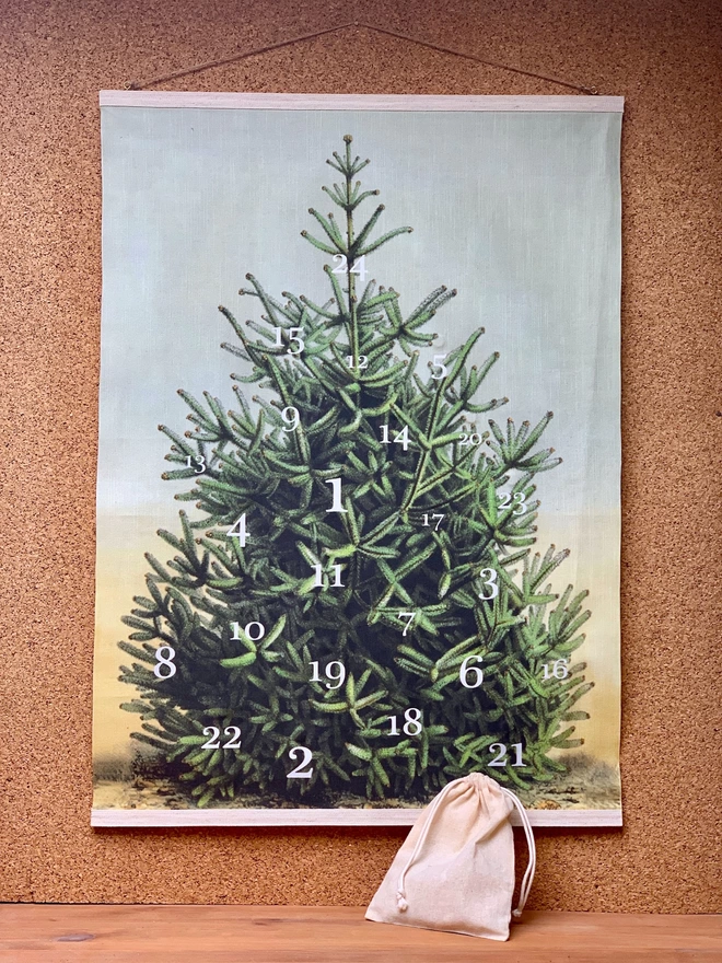 A wall hanging Christmas tree advent calendar