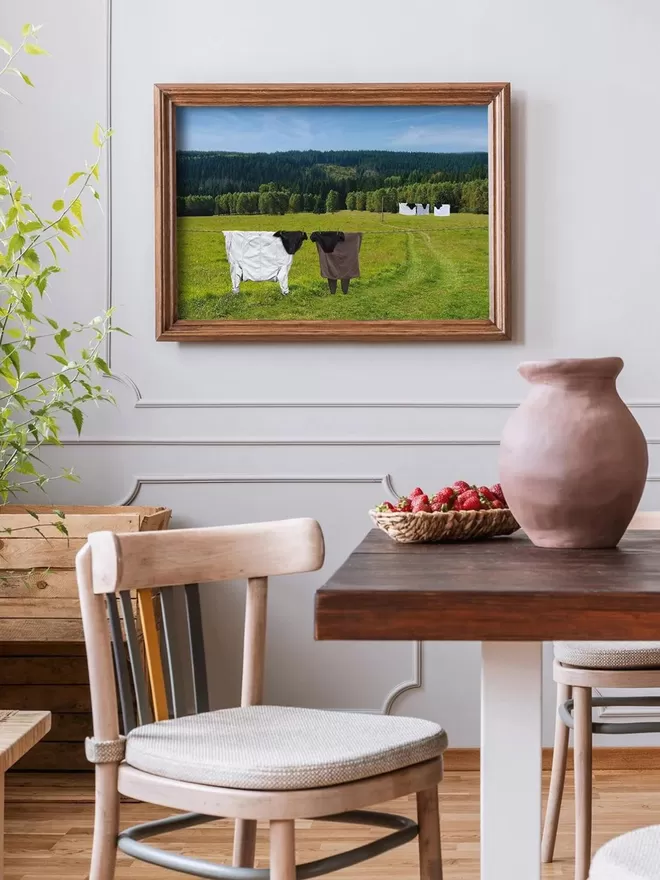 Baa-baa-ra the clothes line sheep hung above a green field seen in a kitchen.