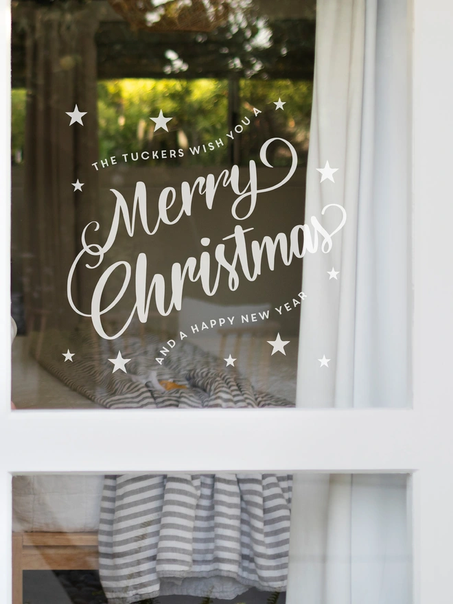 Merry christmas with stars peronalised with your family name window sticker