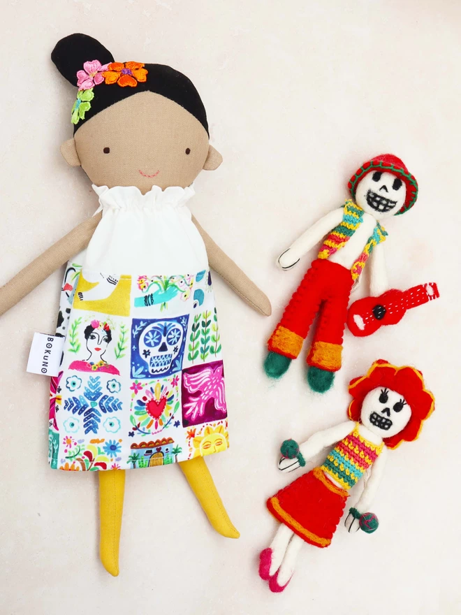 Mexican girl doll with colourful dress and black hair
