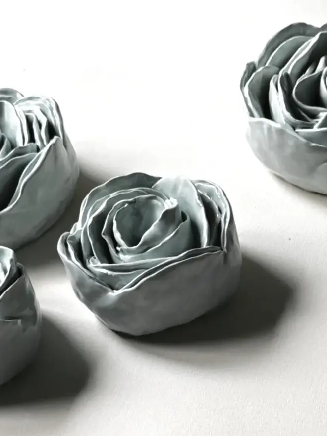 light blue glazed handmade ceramic roses