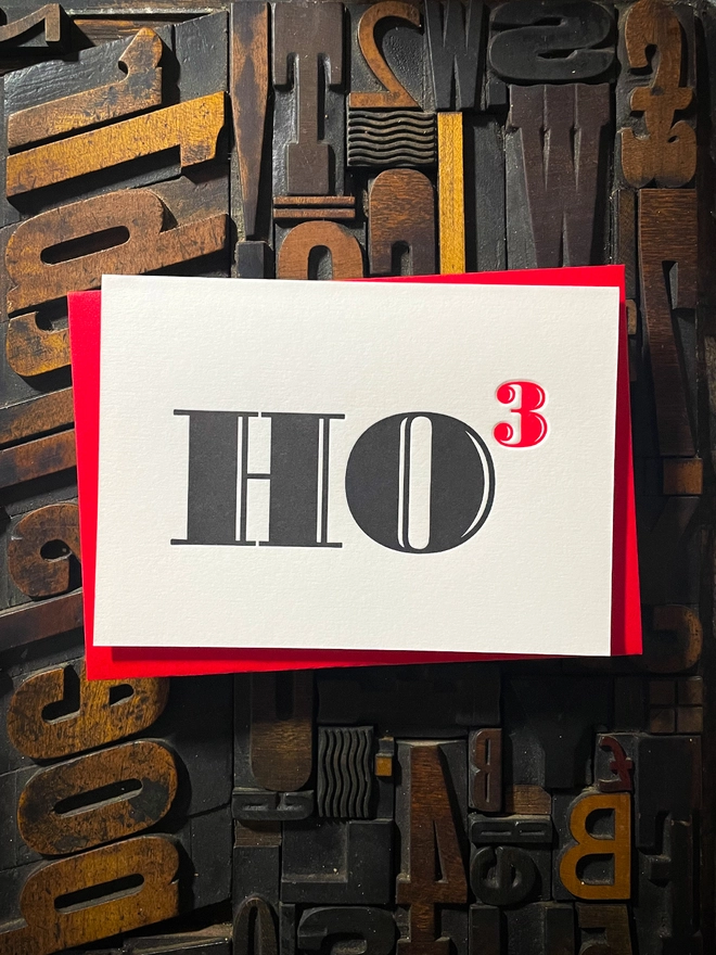 Ho Ho Ho! A beautiful typographic letterpress Christmas card. Printed in rich vibrant red and deep black inks with luxury matching and contrasting envelopes; ideal to send to your designer friends at the festive season.