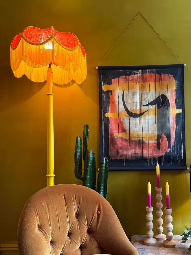 Tangerine Hessian Petal Lampshade With Butterscotch, in a room. 