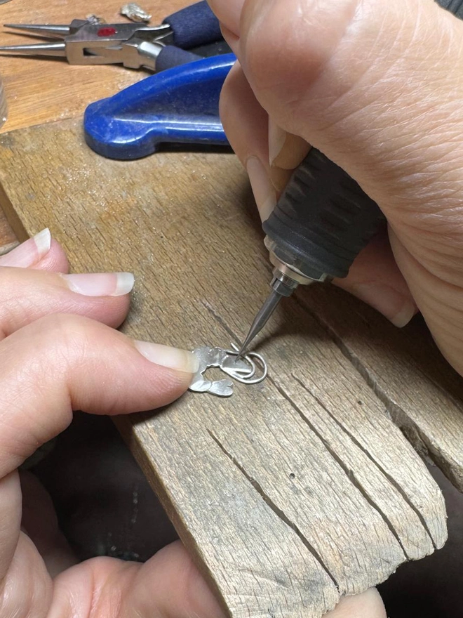 Louise Murphy Jewellery hand making each necklace