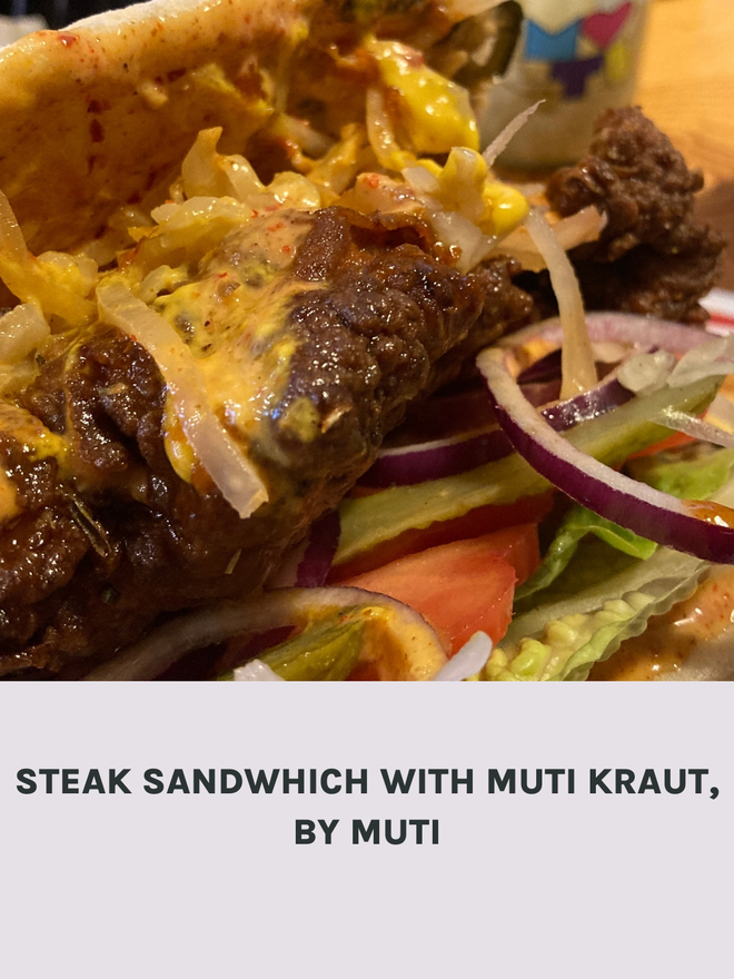 A Steak Sandwich With Muti Kraut.