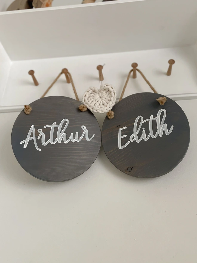 round wooden name sign