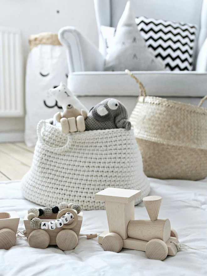  Zuri House. L ivory basket.