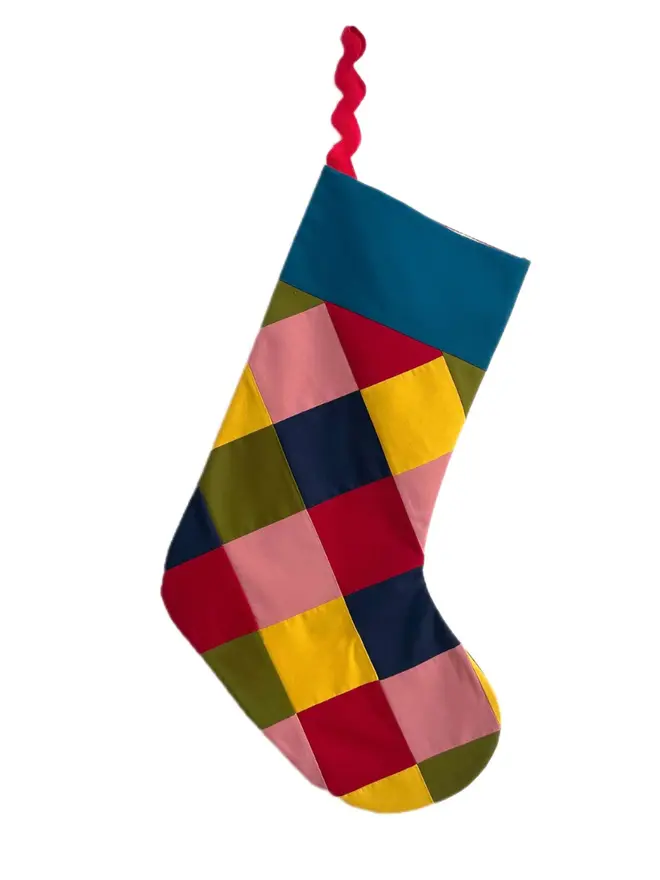 Harlequin Patchwork Stocking, hanging. 