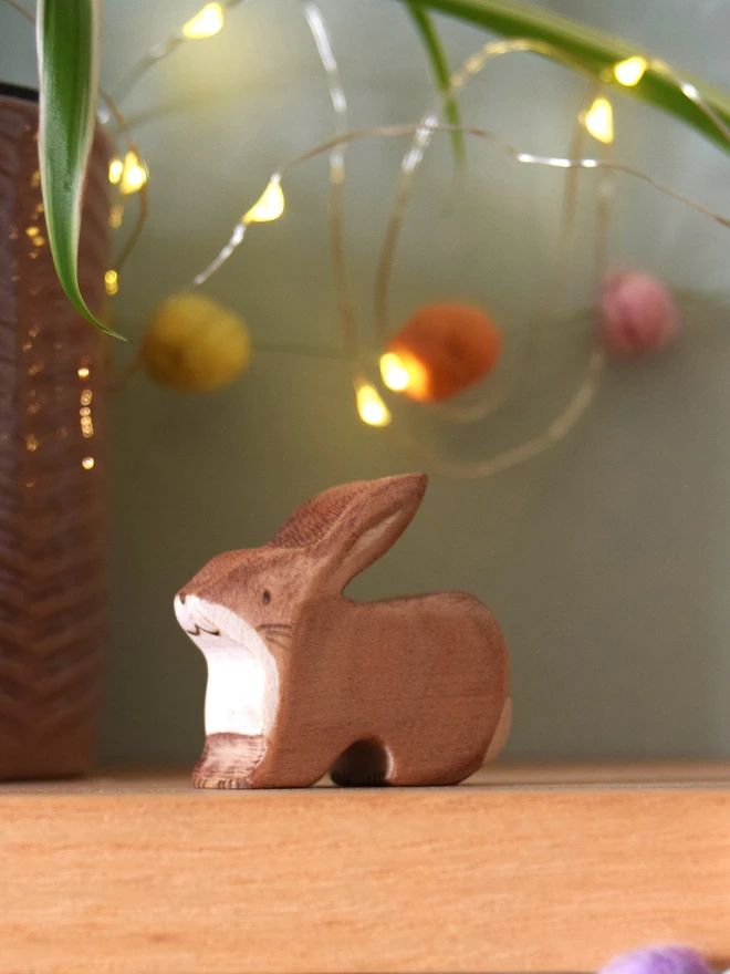 wooden brown rabbit on shelf