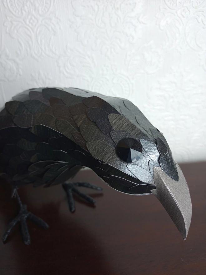 close up of the crow paper sculpture