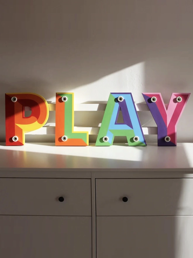 Play sign without lightbulbs
