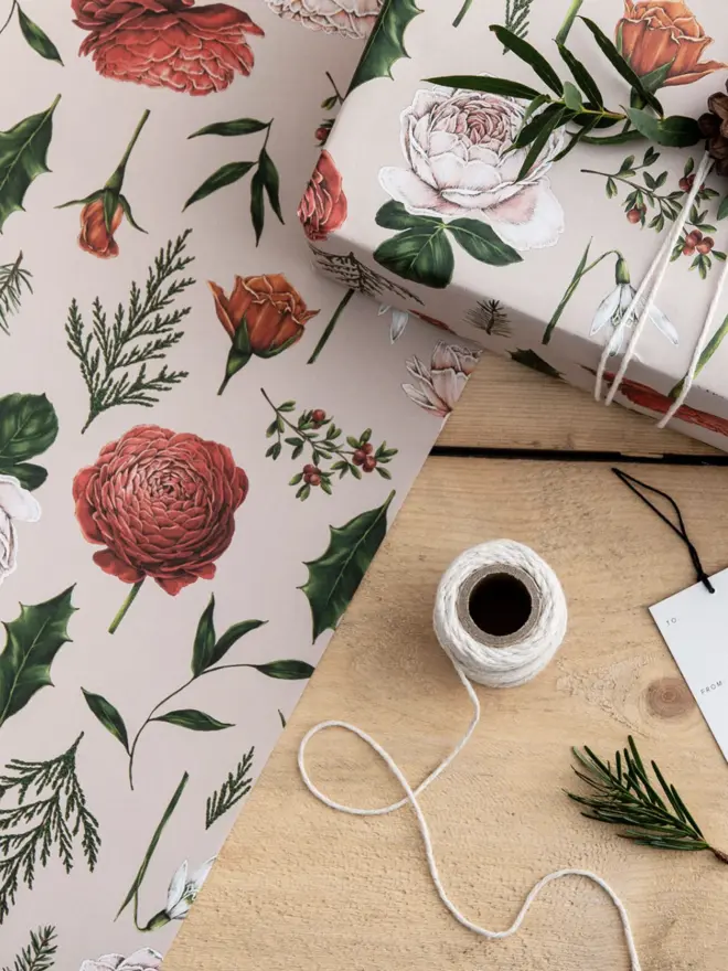 pink base christmas wrap with red and pink roses
