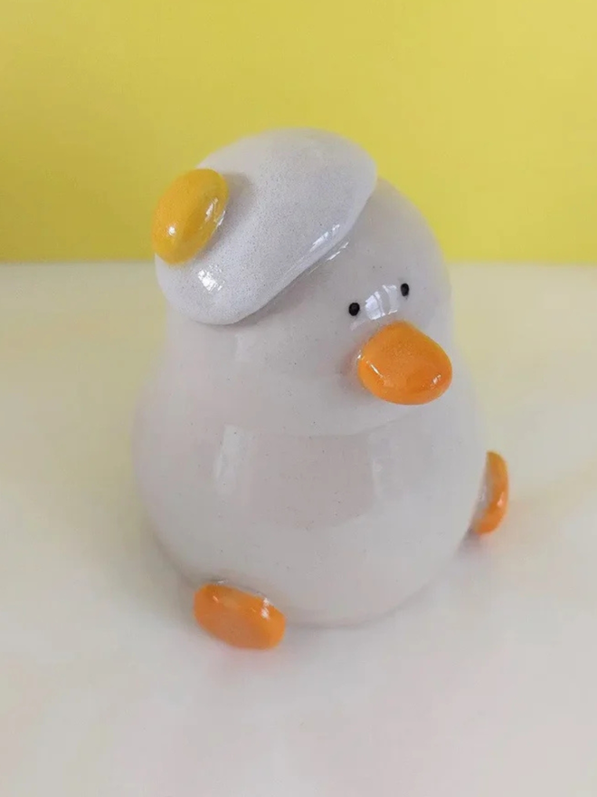 Duck egg head ceramic sculpture
