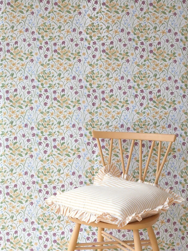 Oxford Meadow wallpaper room setting with wooden chair and cushion