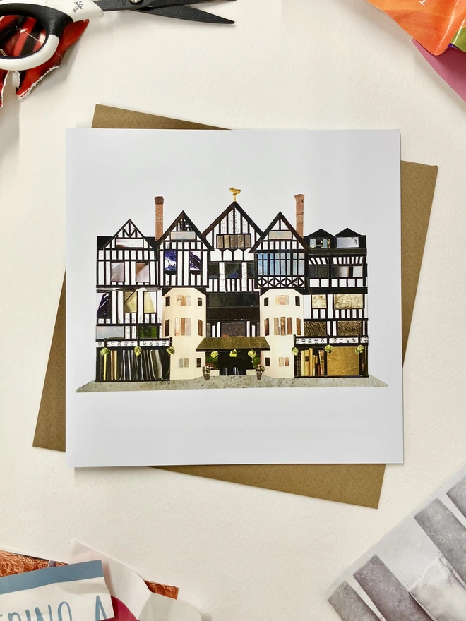 Greetings Card with a collaged illustration of Liberty London with an envelope on a white background with collage materials.
