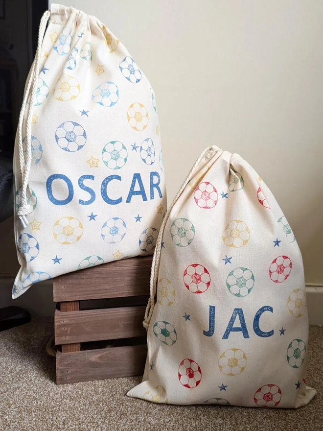 personalised football bag. a drawstring bag with printed footballs and a personalised name.