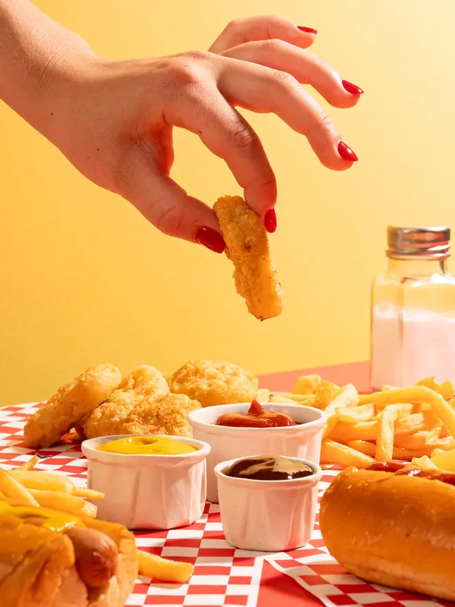 Complete Sauce Pot Bundle (Set Of 3), with food being dunked into them. 