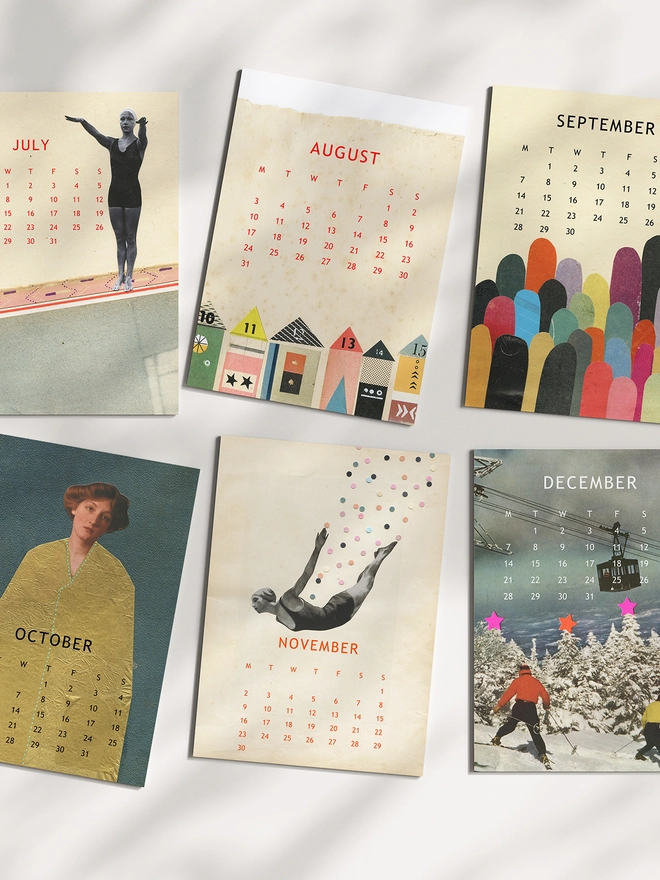Six pages of a desk calendar sitting on a sunlit desk.