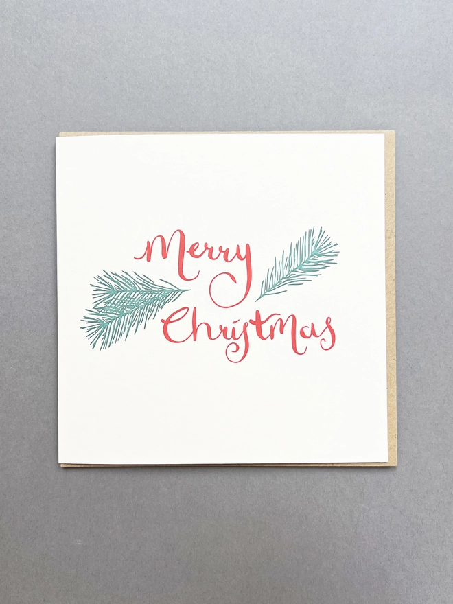 Merry Christmas letterpress printed card with pine tree detail