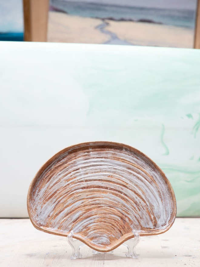 Ceramic shell plate