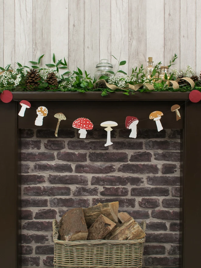 Mushroom and Toadstool Garland Displayed on Decorated Mantelpiece