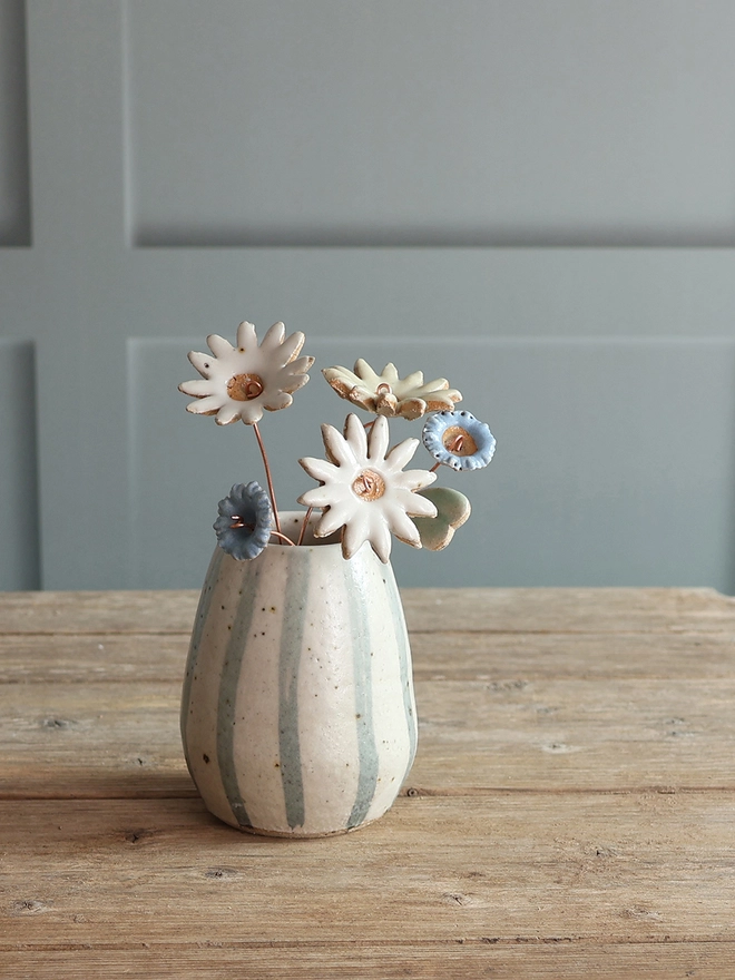 Handmade Ceramic Stoneware Small Vase in Blue and White Stripe filled with handmade ceramic flowers 
