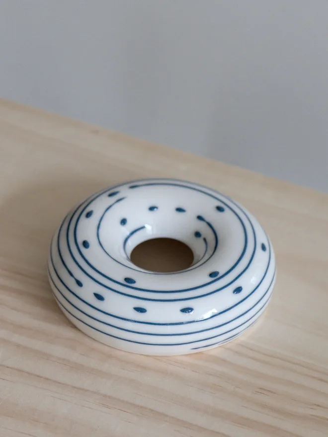 Avocado Planter White & Blue Handmade porcelain avocado planter with carved blue pattern, designed to hold an avocado seed for sprouting