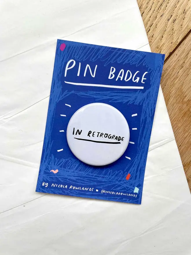 In retrograde badge