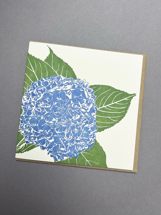 Bright colours of blue and green on the leterpress printed uncoated card