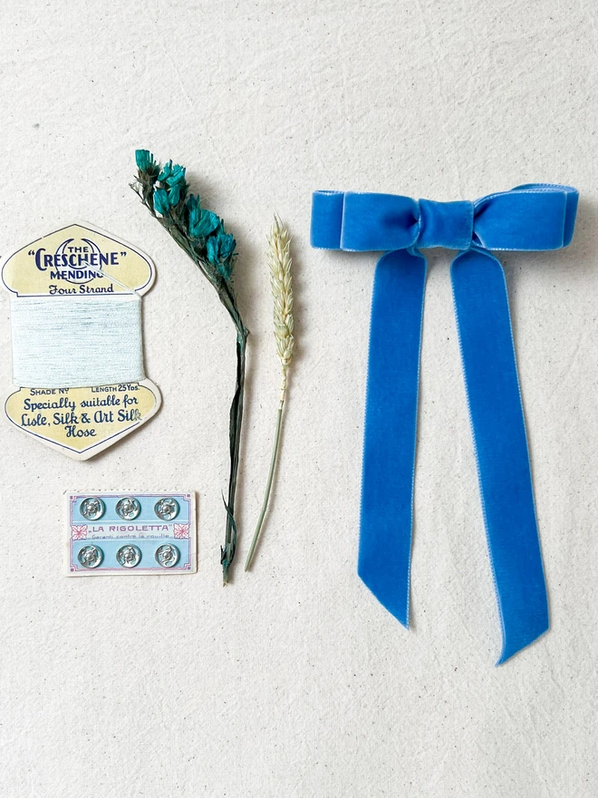 large bright blue velvet hair bow for girls with vintage haberdashery