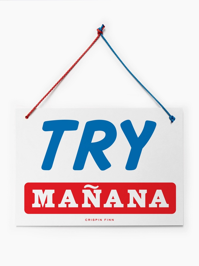 Printed double sided sign with the words Try Mañana