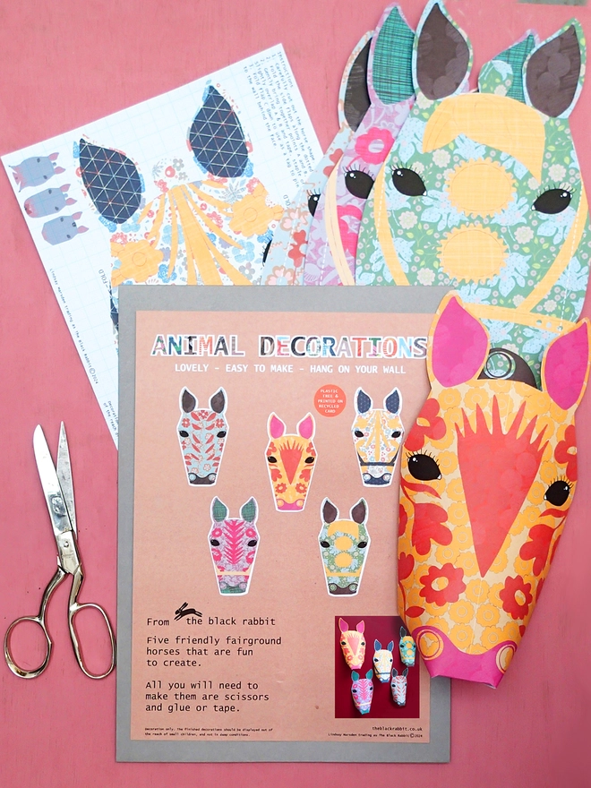 the contents of the carousel horses wall decoration kit