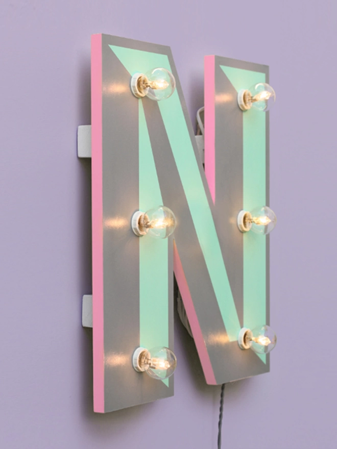 Custom letter wall light with pink edges
