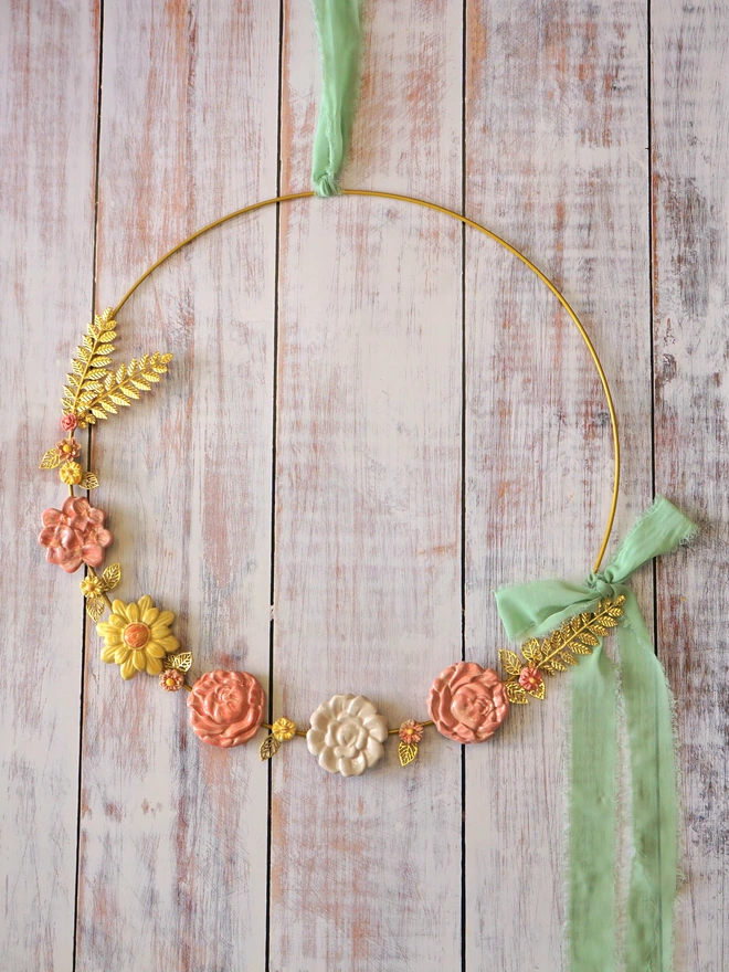 flower wreath, ceramic flower wreath, Flower decoration, flower wall hanging, Jenny Hopps Pottery, decorative wreath