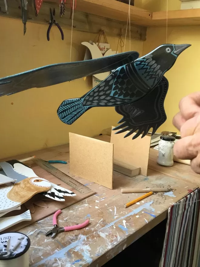 side view of Crow in the studio for final details