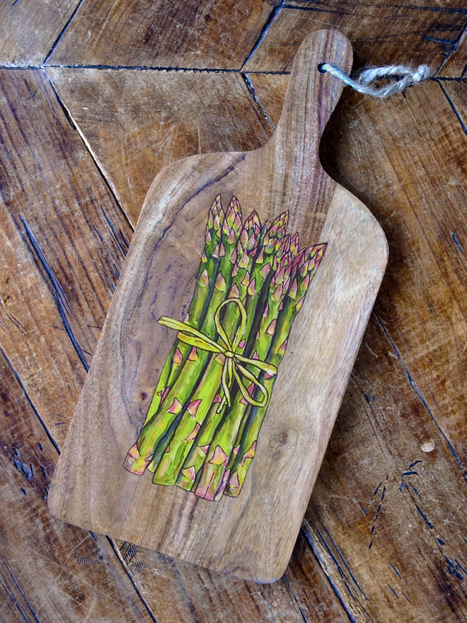 Asparagus design handpainted on wooden serving board