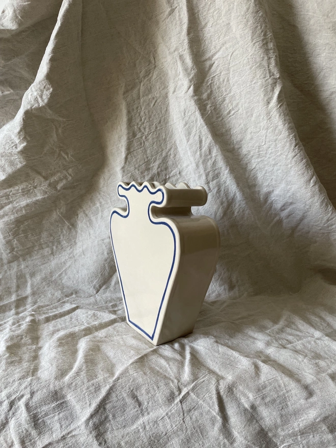 A vase with a blue outline