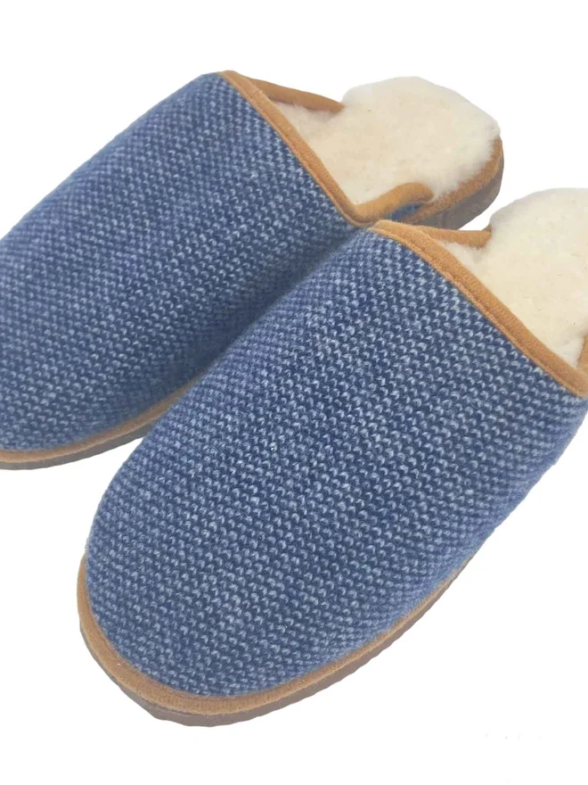 NAVY BLUE CHECKED SLIPPERS ON A WHITE BACKGROUND